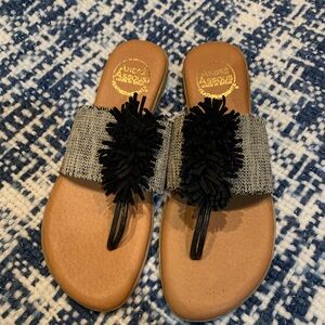 Andre Assous Black and Tan Sandals with Fringe